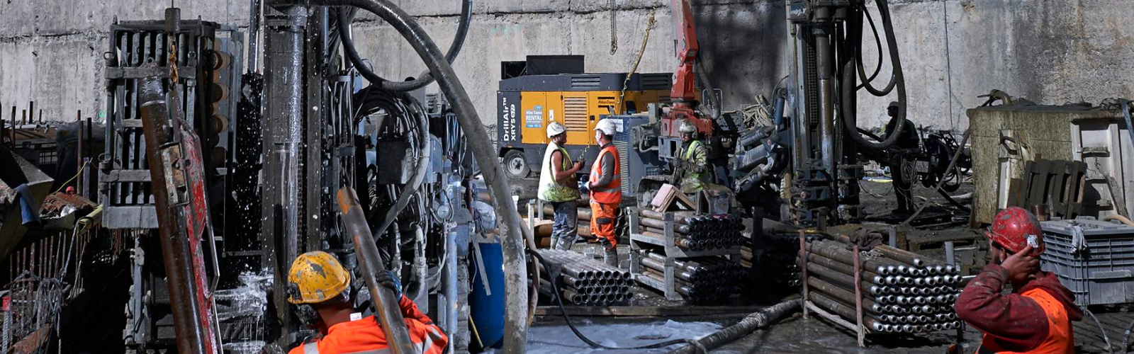 large compressor in use by builders at work site