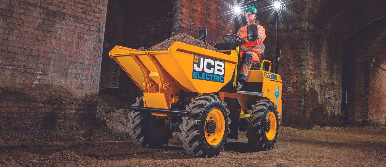 worker on electrical dumper